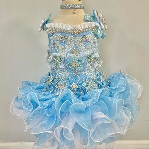 Girls glitz pageant birthday princess cupcake dress.
Blue and white.
